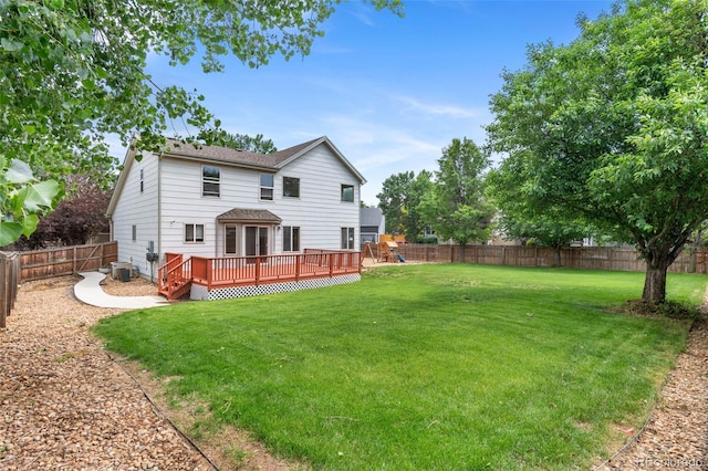 7171 Canyon Way, Frederick, CO 80504 - back of house featuring a fenced backyard, a deck, a playground, and roof with shingles