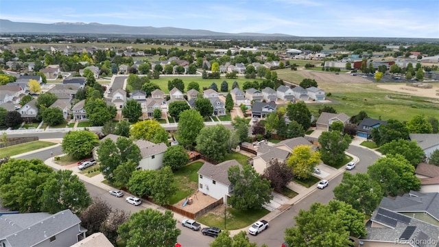 7171 Canyon Way, Frederick, CO 80504 - aerial perspective of suburban area with a mountainous background