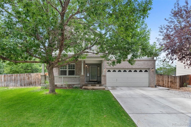 7171 Canyon Way, Frederick, CO 80504 - view of front of property with driveway, brick siding, and covered porch