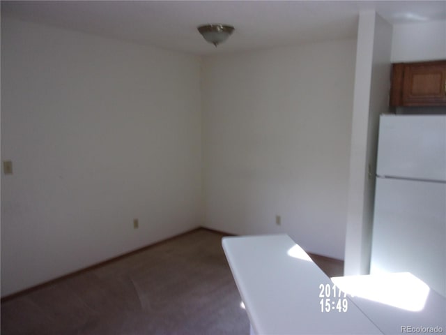 12093 W Cross Dr Unit 308, Littleton, CO 80127 - unfurnished dining area with carpet floors