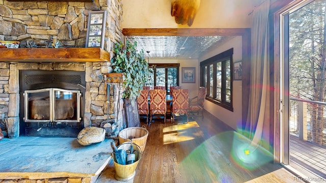 1300 N State Highway 149, Lake City, CO 81235 - interior space with wood finished floors and a stone fireplace