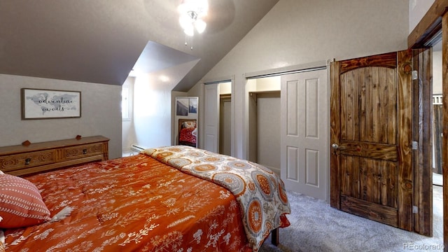 1300 N State Highway 149, Lake City, CO 81235 - carpeted bedroom with vaulted ceiling, a ceiling fan, and two closets