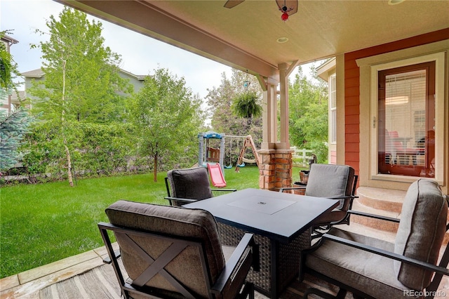 24686 E Florida Ave, Aurora, CO 80018 - view of patio / terrace featuring a playground and a ceiling fan
