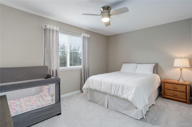 24686 E Florida Ave, Aurora, CO 80018 - bedroom featuring light carpet, baseboards, and a ceiling fan