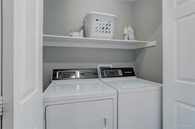 24686 E Florida Ave, Aurora, CO 80018 - washroom featuring washer and clothes dryer