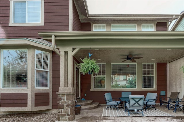 24686 E Florida Ave, Aurora, CO 80018 - view of exterior entry featuring ceiling fan and a patio area
