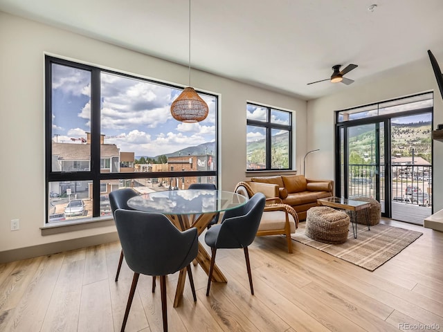 75 W 4th St Unit 205W, Silverthorne, CO 80498 - dining room with ceiling fan and wood finished floors