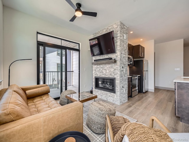 75 W 4th St Unit 205W, Silverthorne, CO 80498 - living area with ceiling fan, light wood-type flooring, a fireplace, and recessed lighting