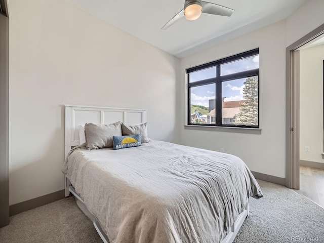 75 W 4th St Unit 205W, Silverthorne, CO 80498 - carpeted bedroom with a ceiling fan and vaulted ceiling