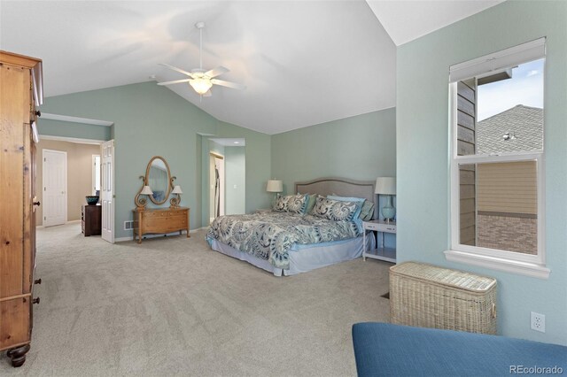 carpeted bedroom with lofted ceiling and ceiling fan