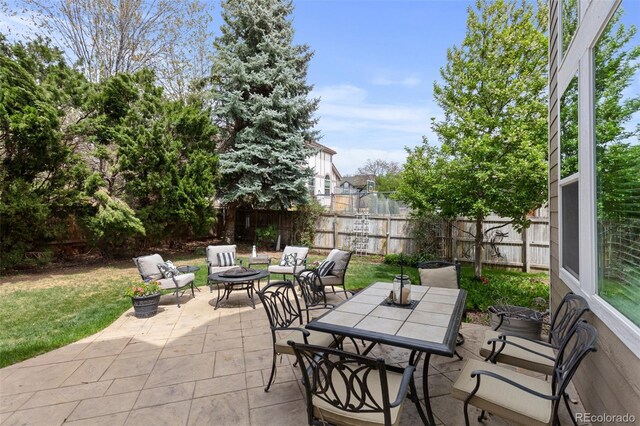 view of patio / terrace featuring an outdoor hangout area and outdoor dining space