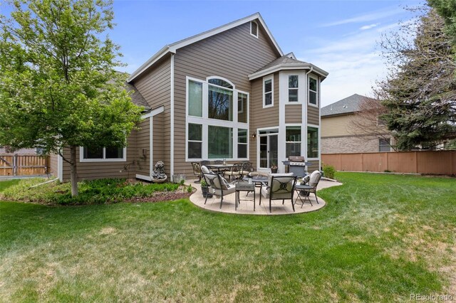 back of house with a patio area