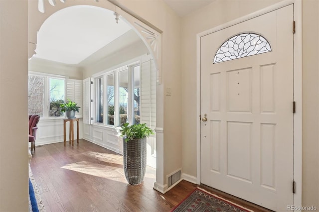 foyer featuring dark hardwood / wood-style floors