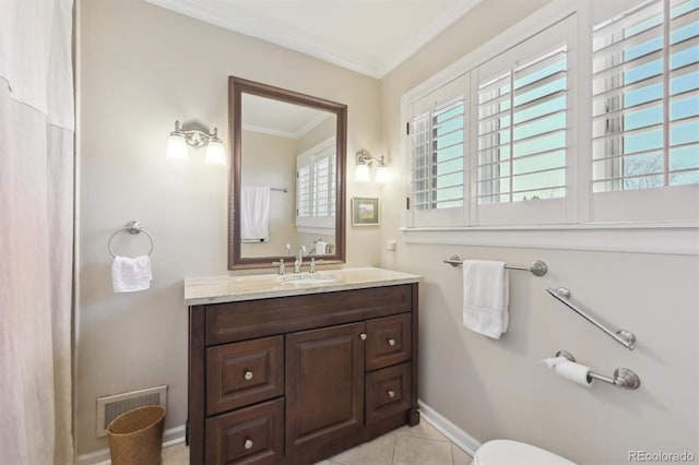 bathroom with tile patterned floors, vanity, and ornamental molding