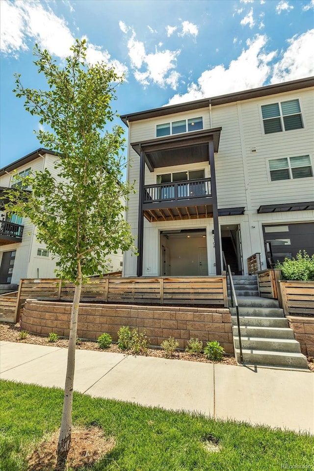 2108 Alcott Way, Broomfield, CO 80023 - multi unit property with a balcony and a fenced front yard