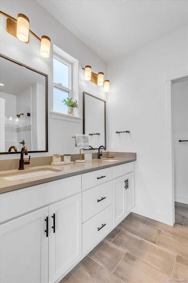 2108 Alcott Way, Broomfield, CO 80023 - full bathroom with double vanity and tiled shower