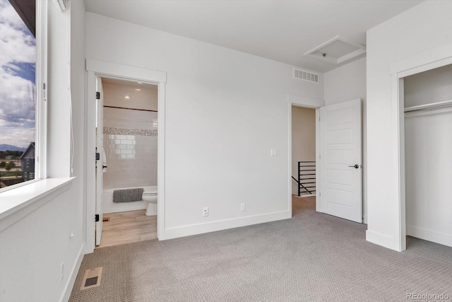 2108 Alcott Way, Broomfield, CO 80023 - unfurnished bedroom with carpet floors, attic access, connected bathroom, and a closet