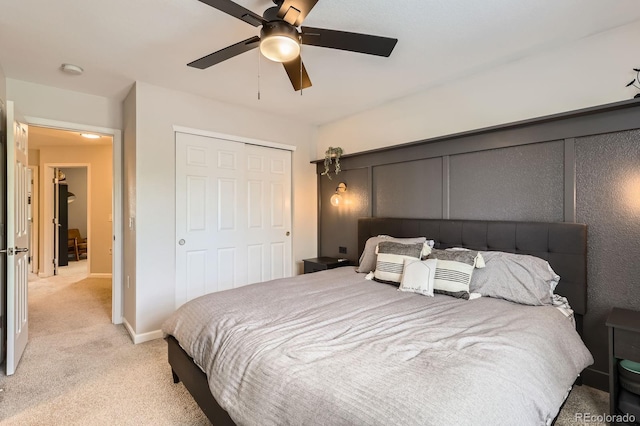 1539 Bennet Mountain Rd, Castle Rock, CO 80109 - bedroom featuring light carpet, a closet, ceiling fan, and baseboards