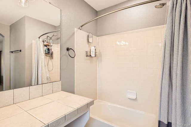 1539 Bennet Mountain Rd, Castle Rock, CO 80109 - full bathroom featuring shower / bath combo, vanity, and a textured wall