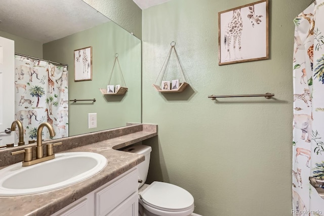 1539 Bennet Mountain Rd, Castle Rock, CO 80109 - full bathroom with vanity, toilet, a textured wall, and curtained shower