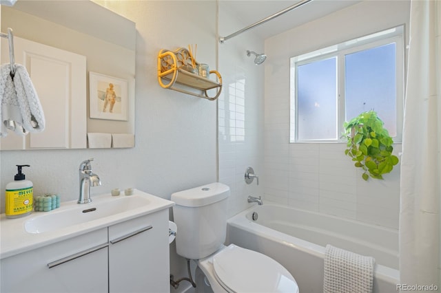 full bath featuring shower / bath combo with shower curtain, toilet, and vanity