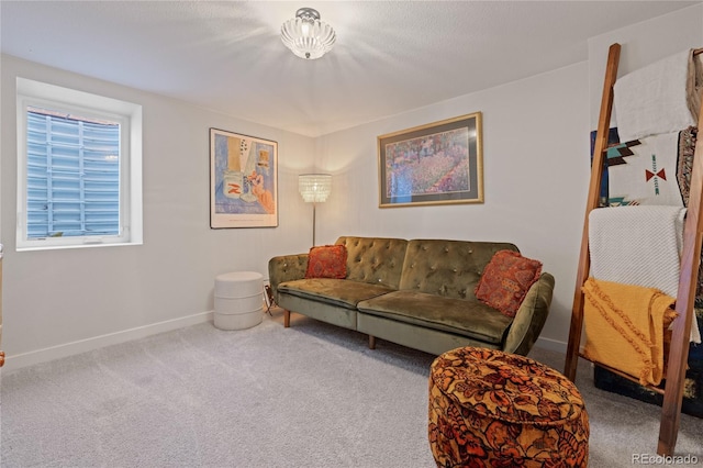 living room with carpet floors and baseboards