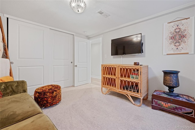 living area with carpet floors and baseboards