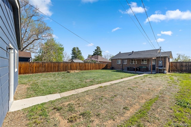 view of yard with a patio area