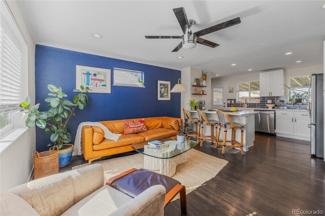 living area featuring dark wood-style flooring, recessed lighting, and ceiling fan