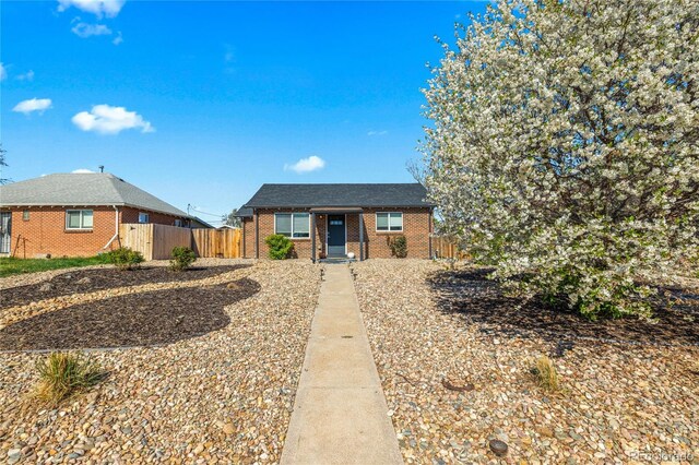 3011 Oneida St, Denver, CO 80207 - view of front of house featuring brick siding