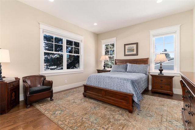 bedroom with light hardwood / wood-style floors