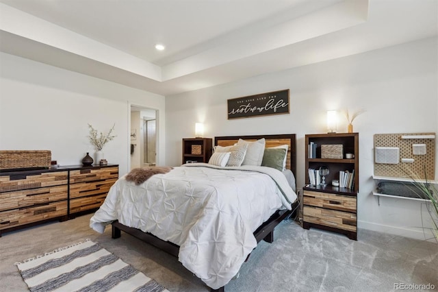 bedroom featuring a raised ceiling, carpet flooring, recessed lighting, and baseboards