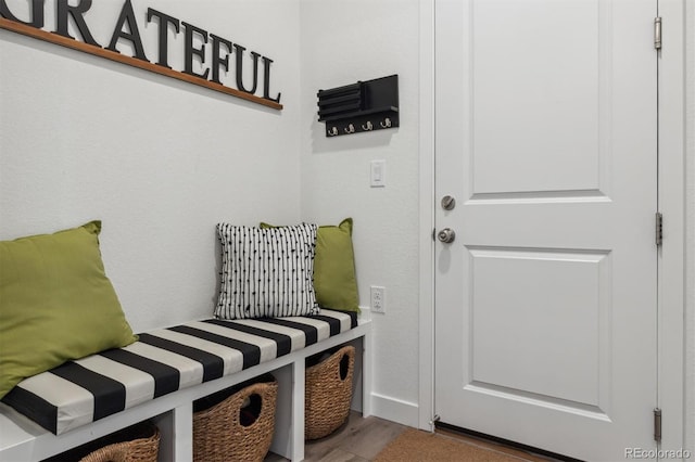 mudroom with wood finished floors