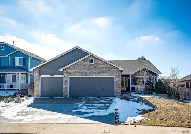 view of front of home featuring concrete driveway, a porch, an attached garage, and brick siding