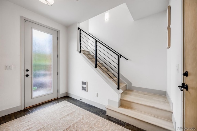 3008 Blake St, Denver, CO 80205 - foyer featuring stairway, healthy amount of natural light, baseboards, and heating unit