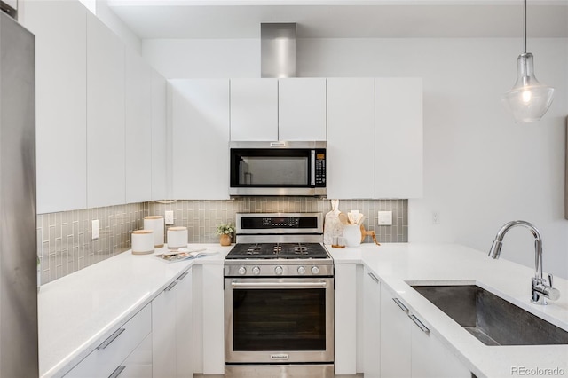 3008 Blake St, Denver, CO 80205 - kitchen with stainless steel appliances, white cabinets, backsplash, and modern cabinets