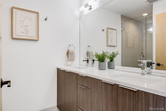 3008 Blake St, Denver, CO 80205 - full bathroom featuring double vanity and a tile shower