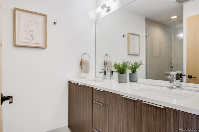 3008 Blake St, Denver, CO 80205 - bathroom featuring double vanity and a tile shower