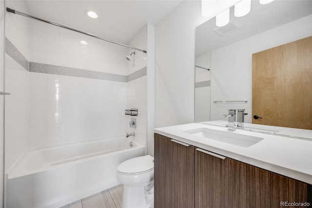 3008 Blake St, Denver, CO 80205 - full bath with vanity, toilet, shower / bathtub combination, and recessed lighting