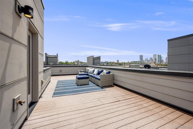 3008 Blake St, Denver, CO 80205 - wooden deck featuring a view of skyline and outdoor lounge area