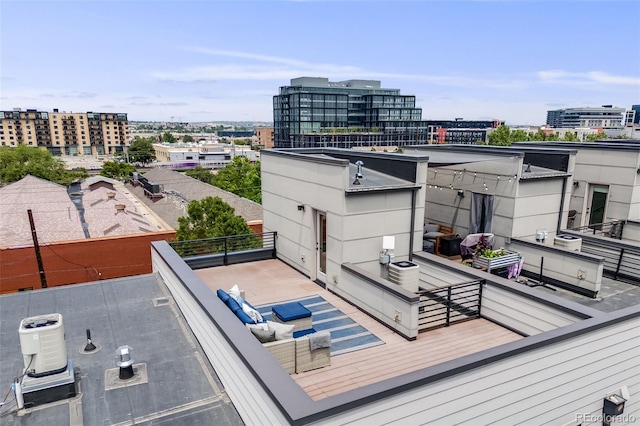 3008 Blake St, Denver, CO 80205 - balcony featuring a city view and central AC unit
