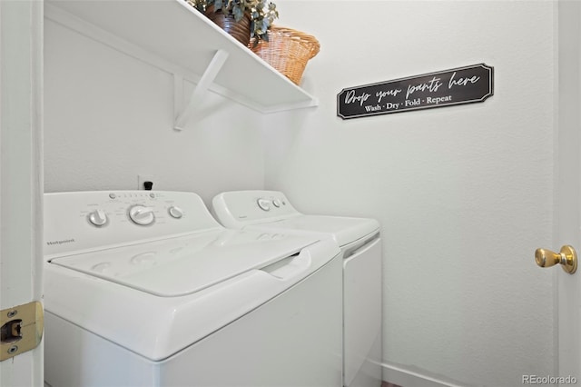 laundry room featuring washer and dryer