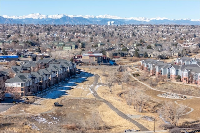 birds eye view of property featuring a mountain view