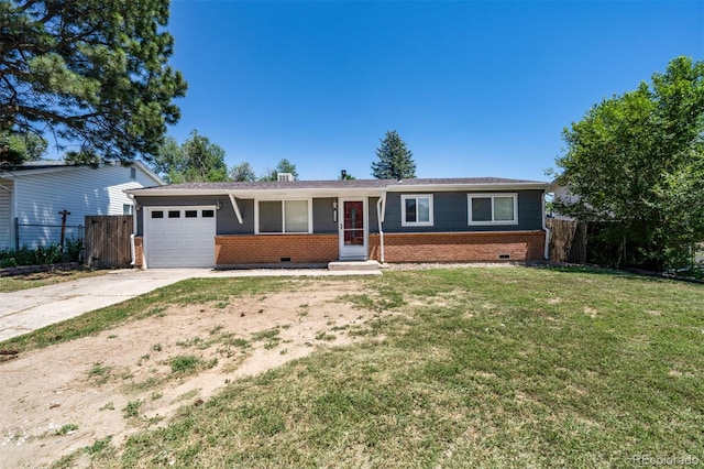 single story home with a garage and a front yard