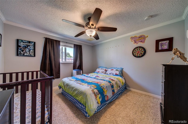 bedroom with carpet, ceiling fan, a textured ceiling, and ornamental molding