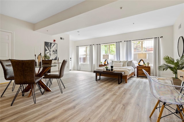 dining room with light wood-type flooring