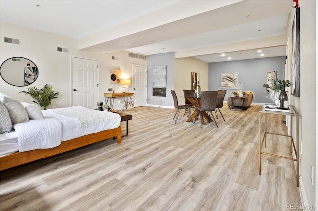 bedroom with light hardwood / wood-style flooring