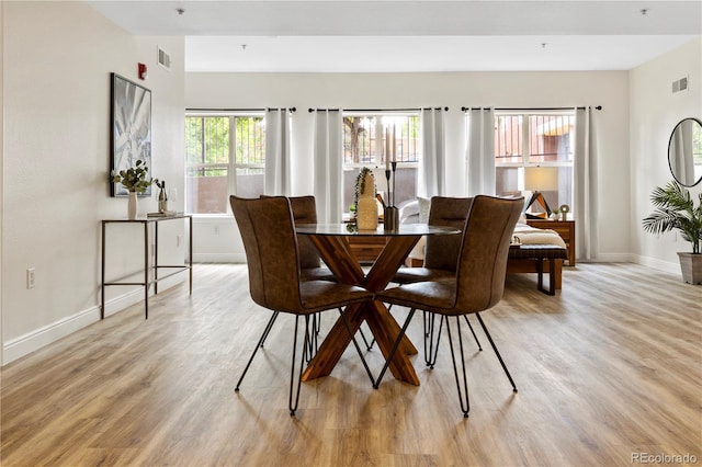 dining area featuring light hardwood / wood-style flooring