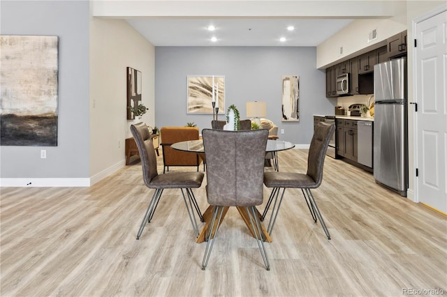 dining area featuring light hardwood / wood-style floors