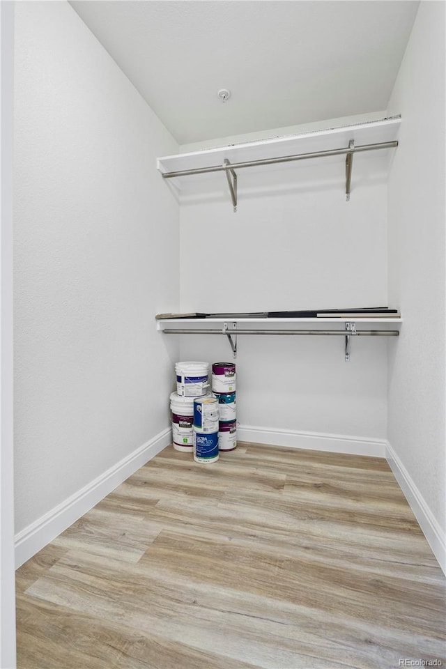 walk in closet featuring light wood-type flooring